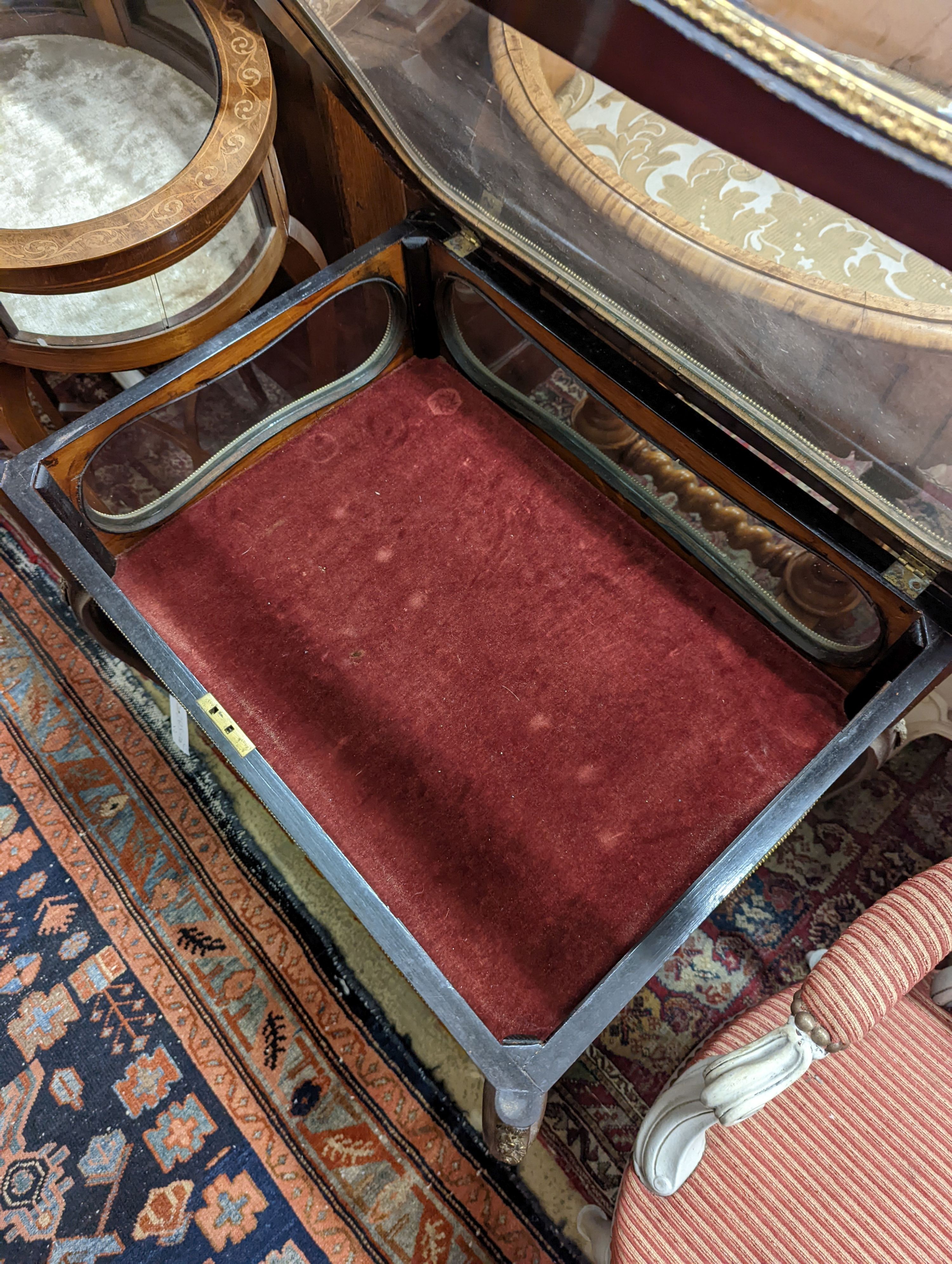 An oval marquetry inlaid mahogany bijouterie table, together with a larger rectangular bijouterie table, larger width 64cm, depth 46cm, height 72cm